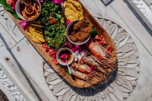 Pro travel tips for tasting local flavors; image of a plate of local Zanzibar food