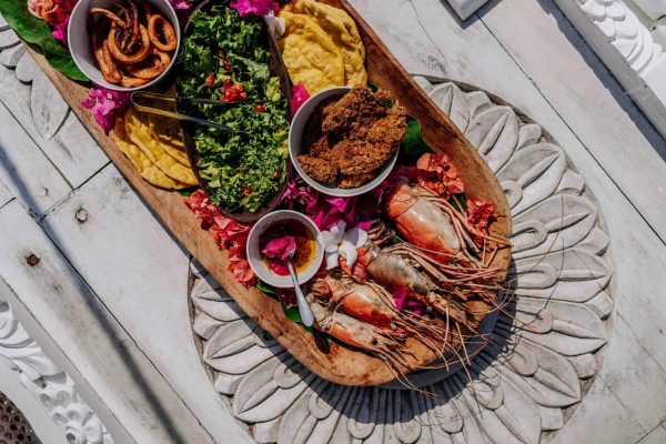 pexels-keeganjchecks-29889197 Pro travel tips for tasting local flavors; image of a plate of local Zanzibar food