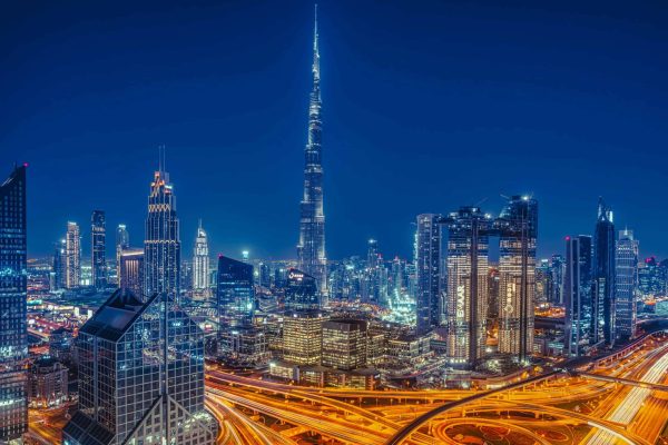 Tips for exploring Dubai on a budget; image of the Dubai skyline at night